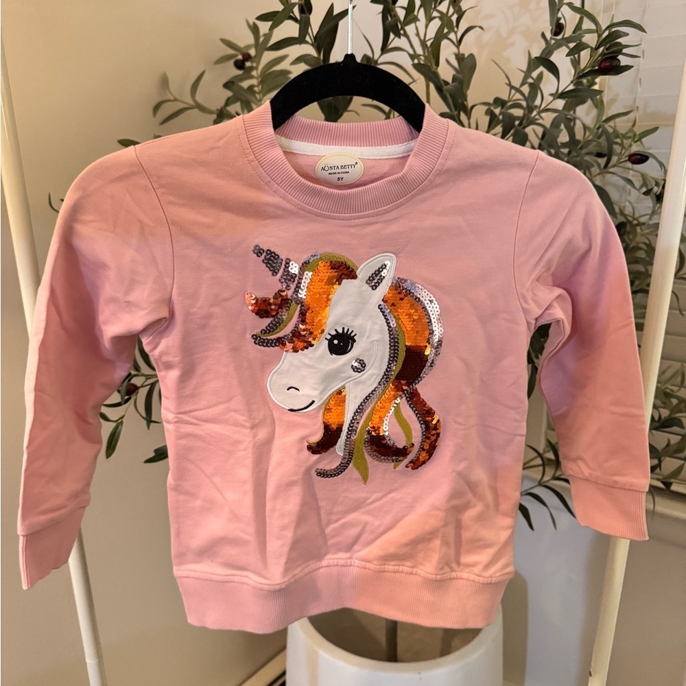 Acosta Betty pink unicorn sweatshirt
5 year

Never worn